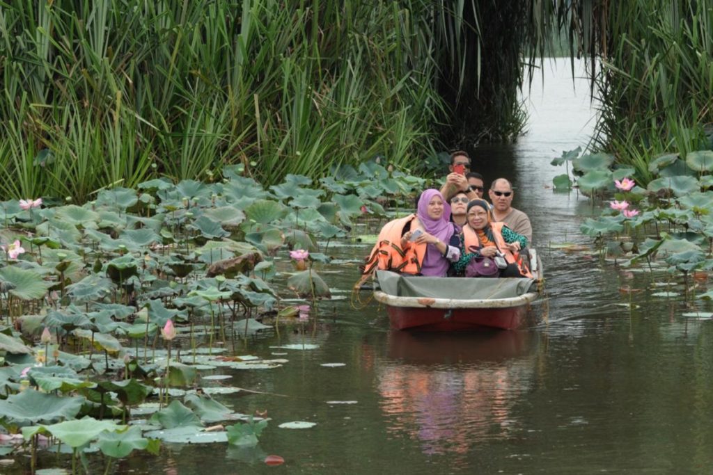 Top 10 Best Things To Do In Pahang 2025 21 Go-On-A-Boat-Ride-At-Chini-Lake-