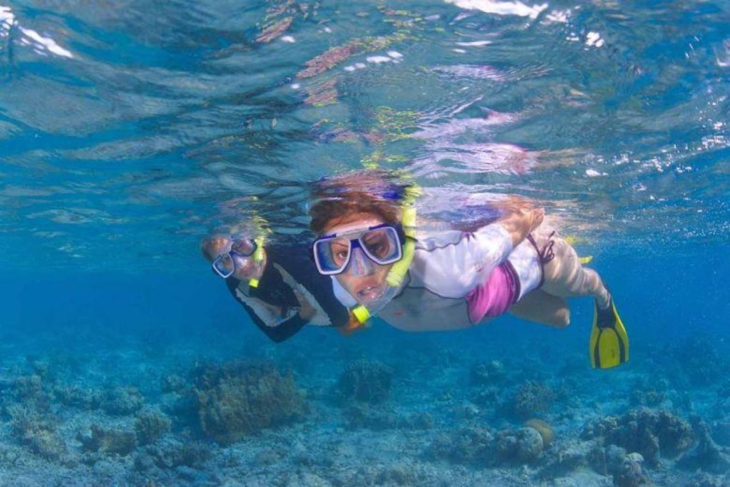 Top 10 Best Things To Do in Mataking Island 2025 3 Playing-In-The-Deep-Ocean-