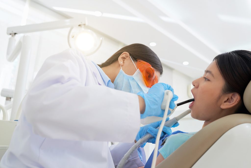 Top 10 Best Dental Clinics in Penang 2025 14 female-dentist-treating-patient-s-teeth-clinic