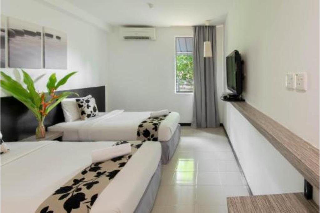 Top 7 Best Budget-Friendly Hotels in Langkawi 2025 9 Rivera-Inn-room