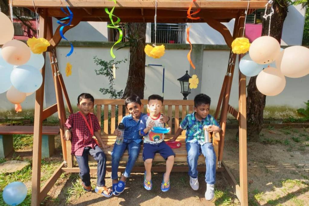 Top 10 Best Kindergartens in KL & PJ 2025 5 Golden-Montessori-Kindergarten-kids-on-swing
