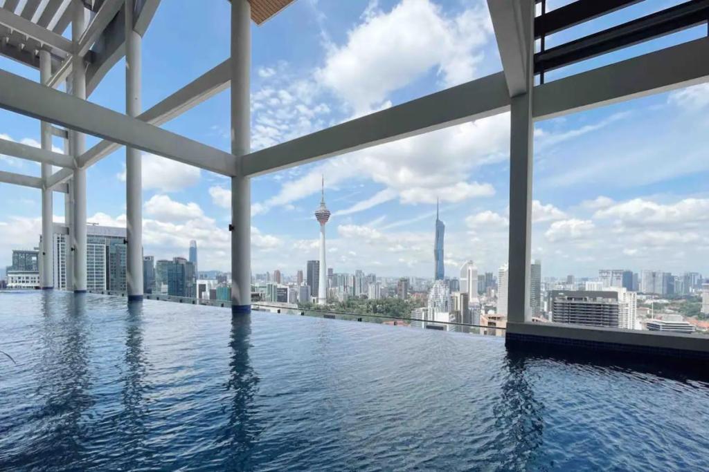 Top 10 Best Airbnbs Under RM150 in KL 2025 17 The-Colony-pool-with-city-view
