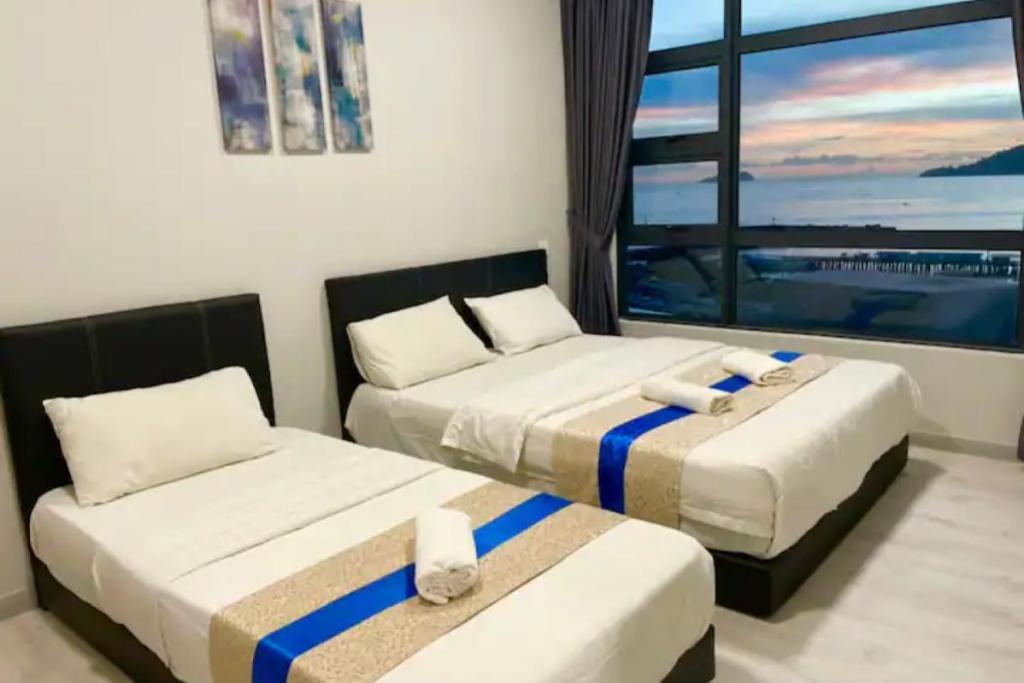 Top 10 Best Airbnbs in Kota Kinabalu 2025 16 Jesselton-Quay-bedroom