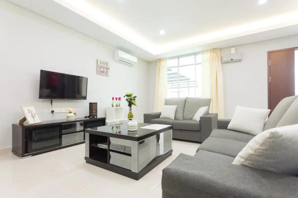 Top 10 Best Airbnbs in Kota Kinabalu 2025 3 Staycation-Tanjung-Aru-living-room