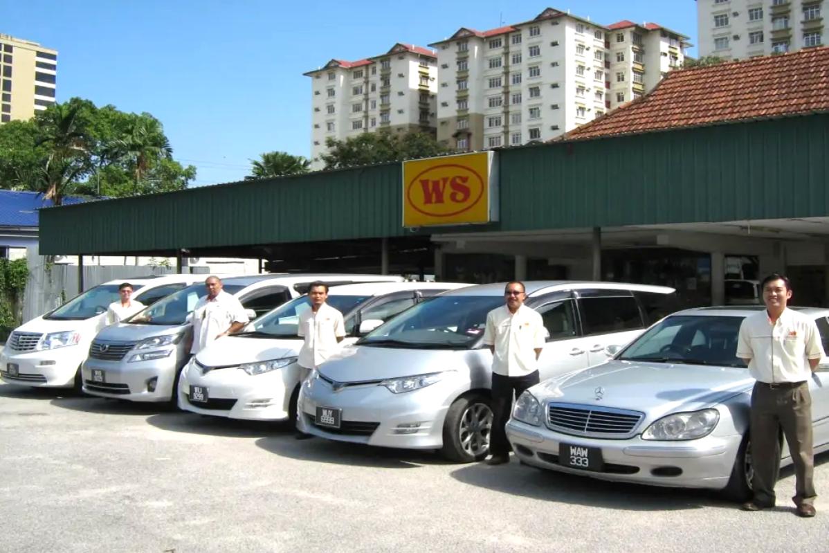 Top 10 Best Cheap Car Rentals Below RM400 Per Day in Kuala Lumpur 2025 11 WS-staff-beside-cars