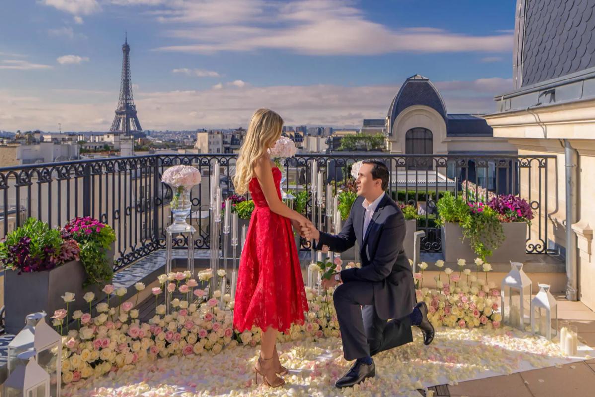 Top 20 Best Proposal Ideas in Malaysia 2025 16 Man kneeling and holding woman's hand while proposing in Paris