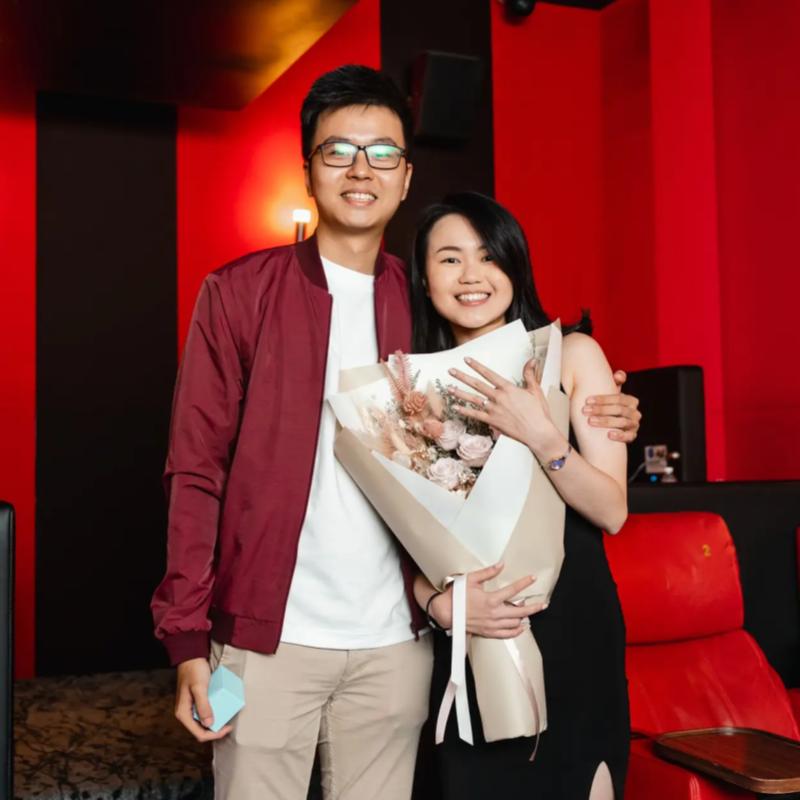 Top 20 Best Proposal Ideas in Malaysia 2025 15 Asian couple hugging in a private cinema after proposal